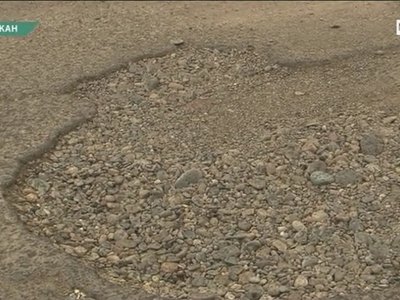 Разбитая дорога в Абакане