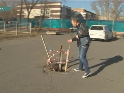 Открытый колодец во дворе дома на Пушкина