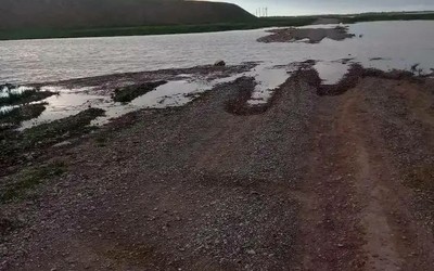 Размыло дорогу в аале Трояков